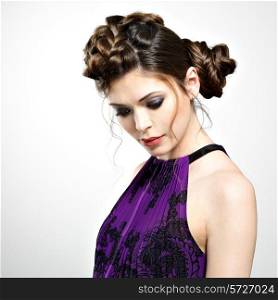 Beautiful face of young woman with stylish hairstyle with pigtails design and fashion makeup