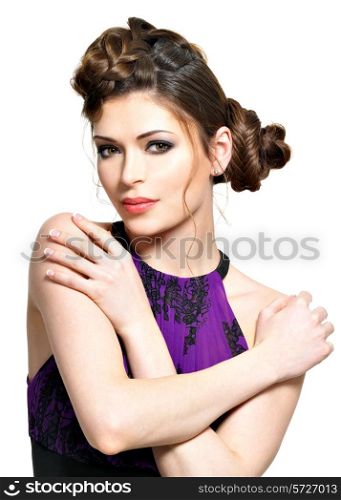 Beautiful face of young woman with stylish hairstyle with pigtails design isolated on white