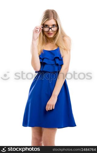Beautiful fashion woman in blue dress using nerd glasses, isolated over white background