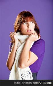 Beautiful fashion woman posing over a violet background