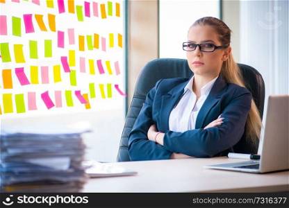 Beautiful female employee with many conflicting priorities 
