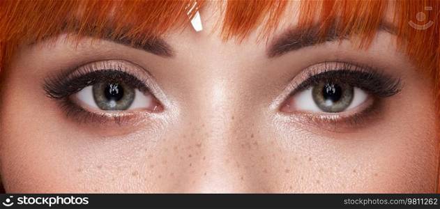 Beautiful female eyes with long eyelashes. Eyelash extensions. Makeup, Cosmetics, Beauty. Close up, Macro