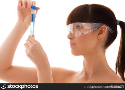 beautiful female lab worker holding up test tube