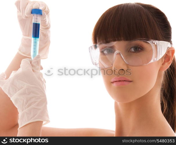 beautiful female lab worker holding up test tube