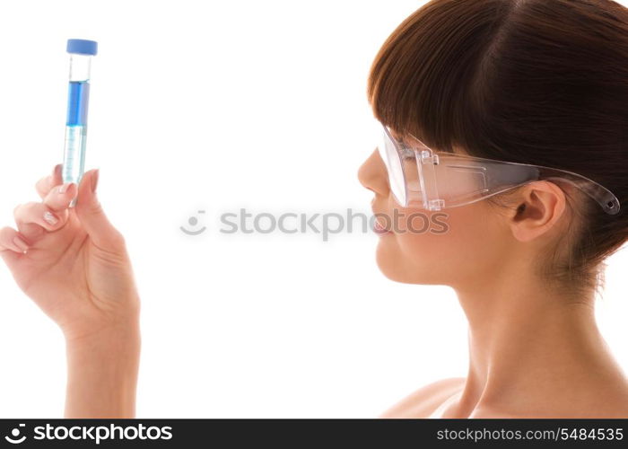 beautiful female lab worker holding up test tube