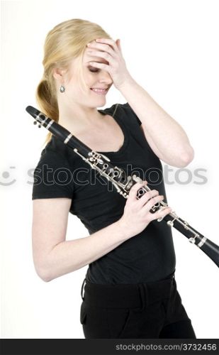 Beautiful Female Musician Blushes after Receiving Praise for Music on Clarinet