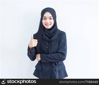 Beautiful female Muslim model in modern kurung and hijab, a modern lifestyle apparel for Muslim women isolated on white background. Beauty and hijab fashion concept. Half length portrait
