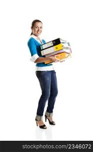 Beautiful female student holding folders isolated on white
