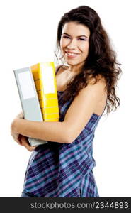 Beautiful female student isolated on white background holding a folder