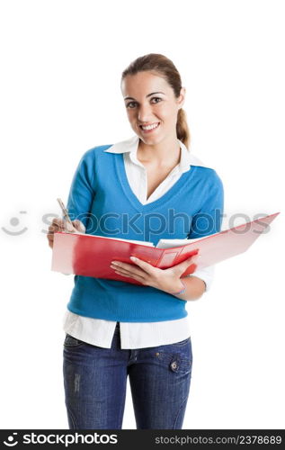 Beautiful female student writing something, isolated on white