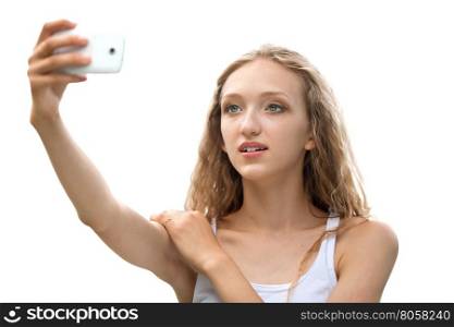 Beautiful Female Teenager Taking a Selfie with Phone Outdoors