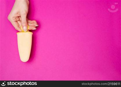 Beautiful Female well-groomed Hands with French manicure over pink background.. Beautiful Female well-groomed Hands with French manicure over pink background