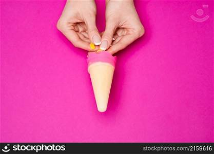 Beautiful Female well-groomed Hands with French manicure over pink background.. Beautiful Female well-groomed Hands with French manicure over pink background