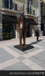 beautiful Fernando Pessoa statue in Sao Carlos square in Lisbon, Portugal