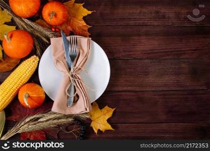 Beautiful festive table setting for Thanksgiving. Autumn and harvest concept.. Festive table setting for Thanksgiving. Autumn and harvest concept.