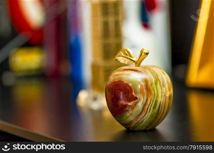 beautiful figurine in the form of an apple made of onyx