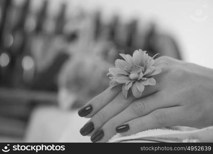 Beautiful fingers with french manicure on the towel. Manicure in a beauty salon.