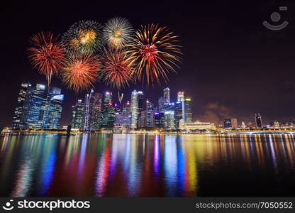 beautiful firework over central business district building of Singapore city at night