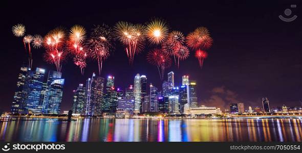 beautiful firework over central business district building of Singapore city at night
