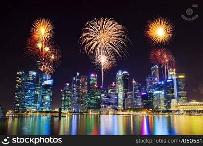beautiful firework over central business district building of Singapore city at night