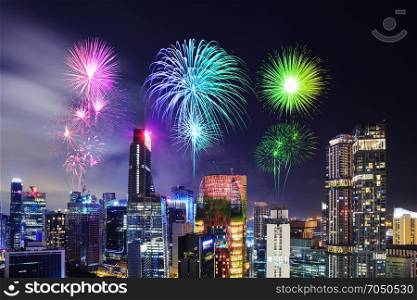 beautiful firework over cityscape view of Singapore city at night