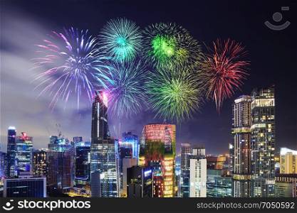 beautiful firework over cityscape view of Singapore city at night