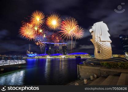 beautiful firework over Merlion park in Singapore city at night