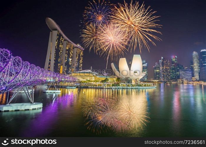 Beautiful fireworks over abstract city celebrates new year in night time