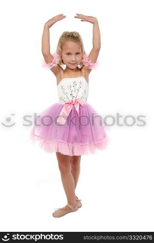 Beautiful five year old girl dressed as ballerina. Full body over white.