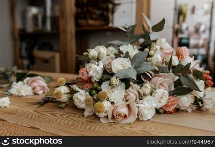 beautiful floral arrangement wooden table. High resolution photo. beautiful floral arrangement wooden table. High quality photo