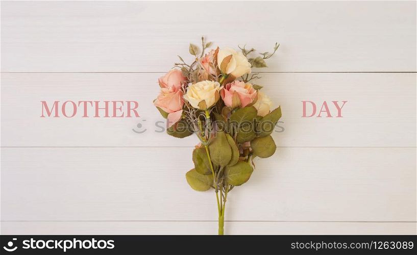 Beautiful flower on wooden background with romantic, mother day or valentine day with pastel tone, spring or summer nature background for decoration, bouquet floral for gift on desk, holiday concept.