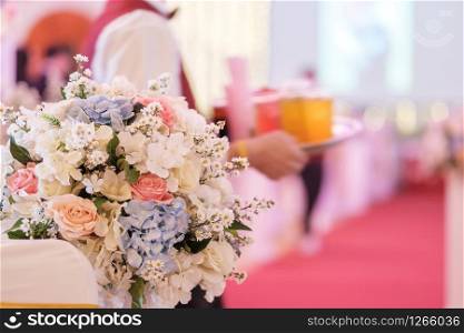 Beautiful flowers and blurred of Wedding ceremony event indoor background