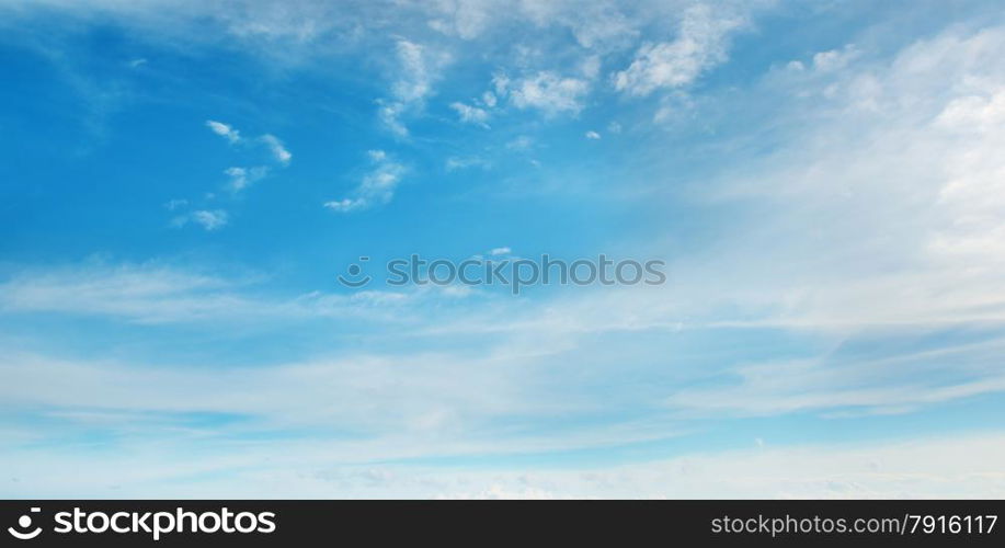 Beautiful fluffy clouds on blue sky