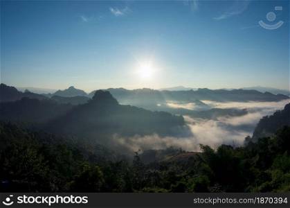 Beautiful fog in the morning forest with green mountains. Baan Jabo, Mae Hong Son, Thailand. Fog in forest.