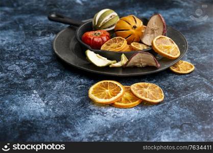 Beautiful food portrait of Wnter seasonal dried fruits with vintage texture background