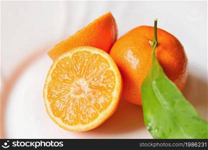 Beautiful fresh fruit - tangerine. Isolated on a clean background.
