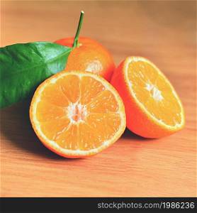 Beautiful fresh fruit - tangerine. Isolated on a clean background.