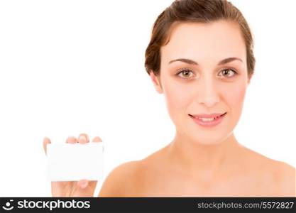 Beautiful fresh woman taking white card - blank. Dressing in pure white background