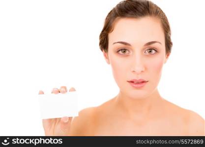 Beautiful fresh woman taking white card - blank. Dressing in pure white background