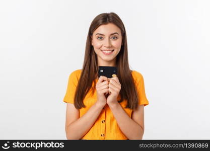 beautiful friendly smiling confident girl showing black card in hand, isolated over white background. beautiful friendly smiling confident girl showing black card in hand, isolated over white background.