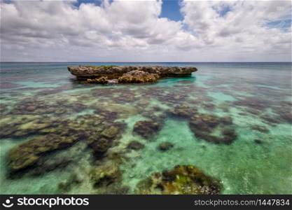 Beautiful Fringing Coral Reef on the coast of Mare, New Caledonia
