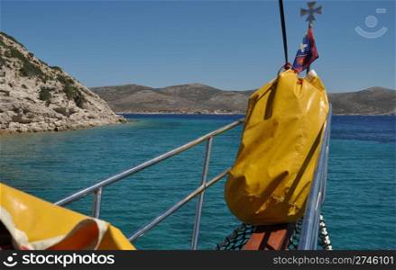 beautiful front view of a cruising boat in Greece waters