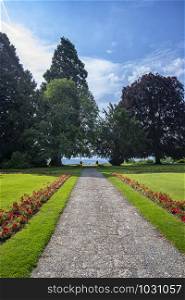 Beautiful garden with an alley on a sunny day, a part of Zeil Castle near Leutkirch, Germany