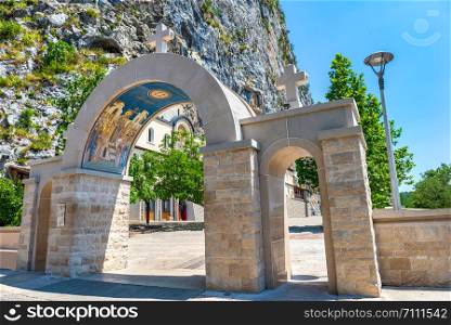 Beautiful gates of Ostrog monastery in the rocks of Montenegro. Gates of Ostrog monastery
