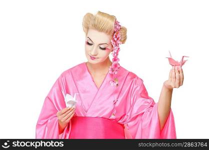 Beautiful geisha holding origami birds