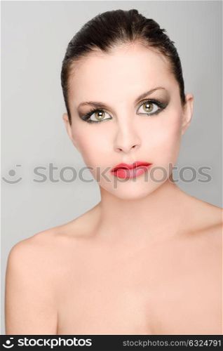 Beautiful girl face with green eyes. Perfect skin, beauty portrait