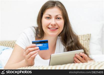 beautiful girl have lot of money on a credit card