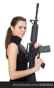Beautiful girl holding a rifle isolated on a white background