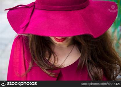 beautiful girl in a hat, red dress, red lipstick. beautiful girl in hat, red dress, red lipstick
