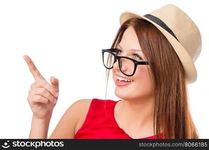 beautiful girl in a hat shows his finger up on a white background